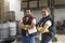 Workers in olives factory posing and looking at camera