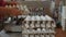 Workers pack fresh hen eggs in the sorting chicken factory