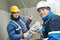 Workers at plastering facade work