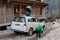 Workers prepare rope for pack belongings of tourists on the car roof. Be ready for the next destination at Lachen in winter.