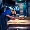 Workers processing Tuna at Tsukiji market in Japan