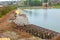 Workers repair platinum and shore fortification at Nyazepetrovsk pond