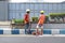 Workers repairing traffic lane dividers and separators made of concrete on asphalt roads