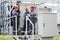 Workers repairing a transformer at the power station.