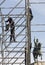 Workers on scaffold near king James 1st of Spain in Mallorca