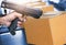 Workers Scanning Bar Code Scanner on Package Boxes. Shipment Boxes. Warehouse Inventory Management