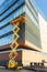 Workers on a Scissor Lift Platform at a construction site. Men at work. Scissor lift platform ensures safe operation at height.