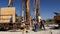 Workers with shovels at construction site