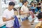 workers at textile company labelling, and packaging their produc