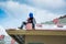 Workers are tiling new roof tiles.