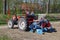 Workers on a tractor are planting bulbs in the soil, Noordoostpolder, Flevoland, Netherlands