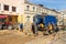 Workers use a suction excavator based on a MAN truck to sample soil in a well for communications