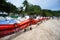 Workers and volunteers line up To put the plastic pallet in the sea near the beach In order to block crude oil.