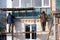 Workers walling the house with wall siding