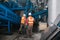 Workers wash equipment at the sorting plant.