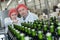 Workers in wine bottling factory