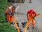 Workers at work to bury the cables of the ultra-fast network