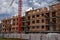 Workers working on new building construction site