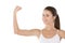 Working on those bulging biceps. Portrait of an attractive young woman pulling her muscle against a white background.