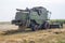 Working combine harvester