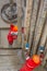 A working driller installs a drill pipe raised from a well.