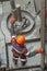 A working driller installs a drill pipe raised from a well.