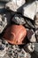 Working helmet on a pile of stones