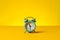 Working hours and overtime work. Hurry work, concept. Clock on yellow background