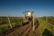 Working machines on the grape field nature