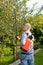 Working man with garden spray