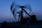 Working oil pump silhouette