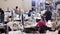 Working process at a garment factory.Many seamstresses work in a garment factory. Large sewing workshop. Seamstresses