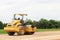 working road roller on ground