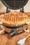 Working, round waffle maker with waffle