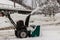 Working with a snowblower, snowblower in action