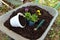 Working truck with soil, fertilizer, pot, flower sprouts and garden tool outside