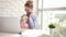 Working woman with baby speaking phone. Business mom with child