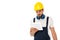 Workman in hardhat and ear defenders holding digital tablet