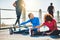 Workout buddies are a great way to boost motivation. two sporty young women doing warmup exercises together outdoors.