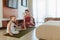 Workout At Home. Mother And Child Stretching Together In Living Room. Little Girl And Young Woman Exercising On Yoga Mat.