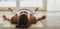 That workout really took it out of her. Shot of a young woman lying on her yoga mat after a workout.