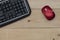 Workplace, keyboard mouse and on wood table