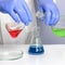 Workplace lab assistant. Hand of a scientific taking a sample tube test.