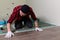 Works man installs laminate. Repair of the apartment, laying laminate flooring