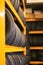 Workshop full of wheels. Closeup shot of a pile of car tyres.