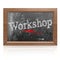 Workshop text written on blackboard