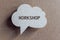 Workshop word written on cloud shaped speech bubble