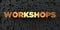 Workshops - Gold text on black background - 3D rendered royalty free stock picture