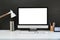 Workspace blank screen desktop computer, Mockup computer, lamp and home office accessories on white desk