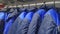 workwear jackets. Jackets workwear for builders and industry. Wardrobe with hangers for industrial workwear